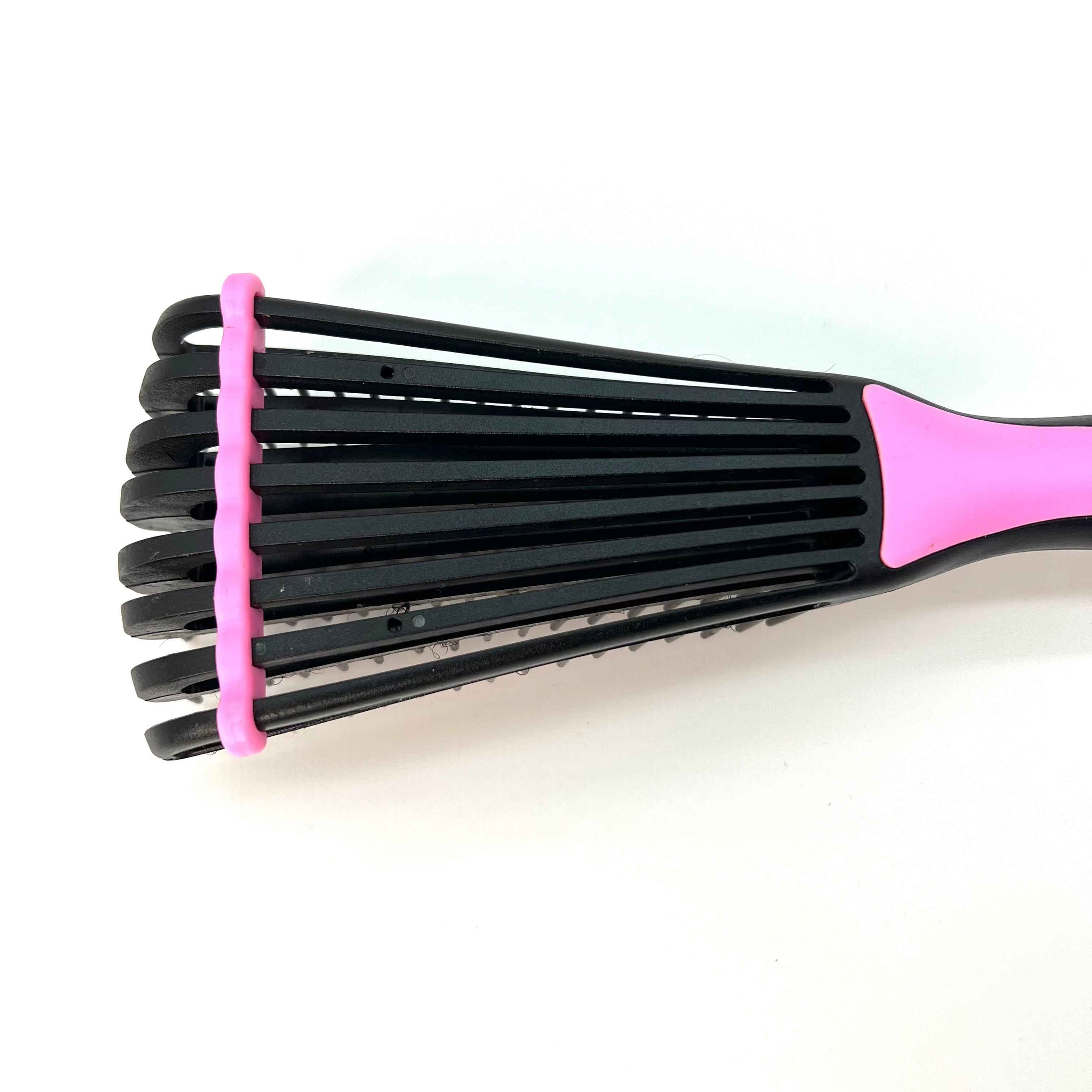 Brosse Afrosette pour démêler les cheveux crépus d’un enfant