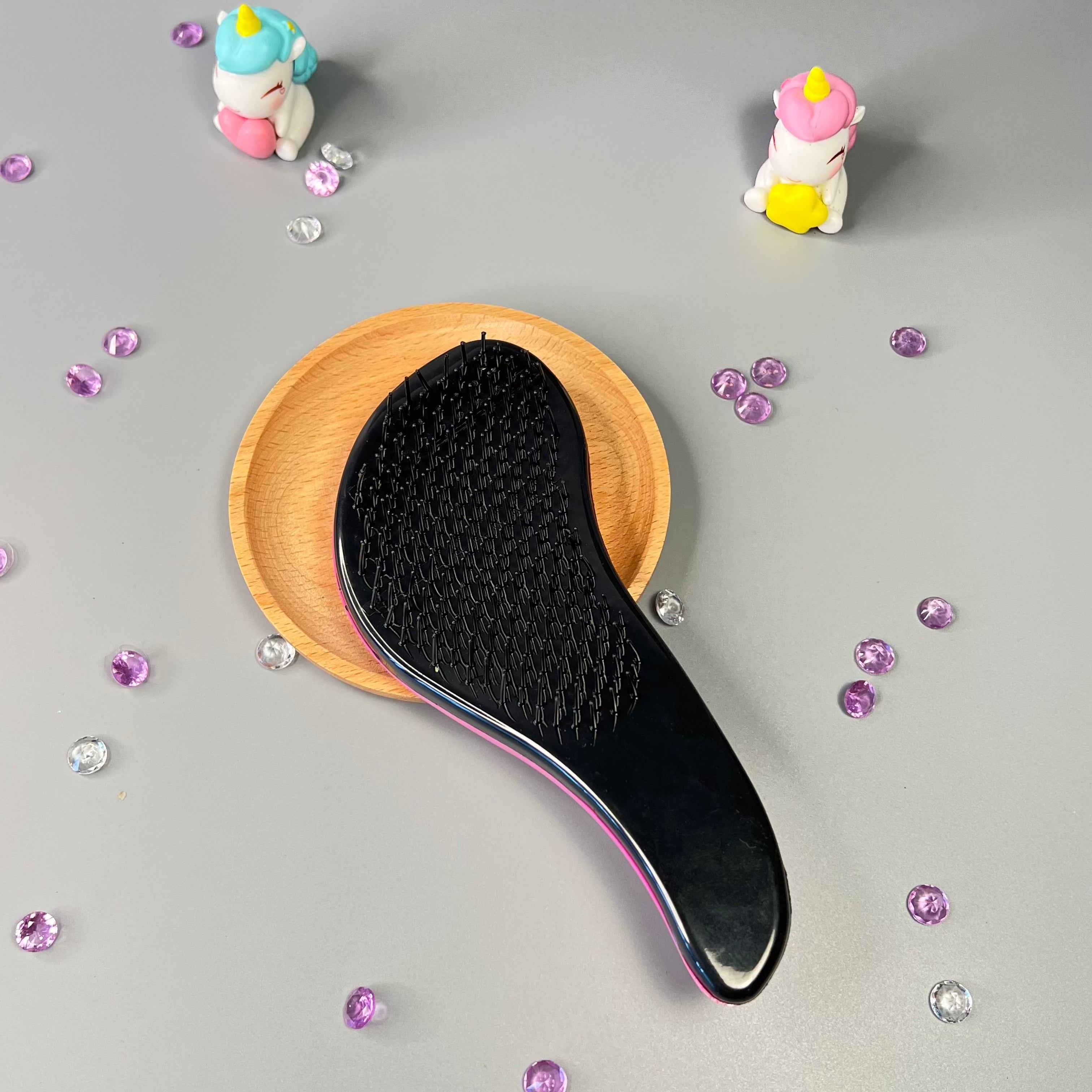 Brosse démêlante pour cheveux bouclés fins et peu denses