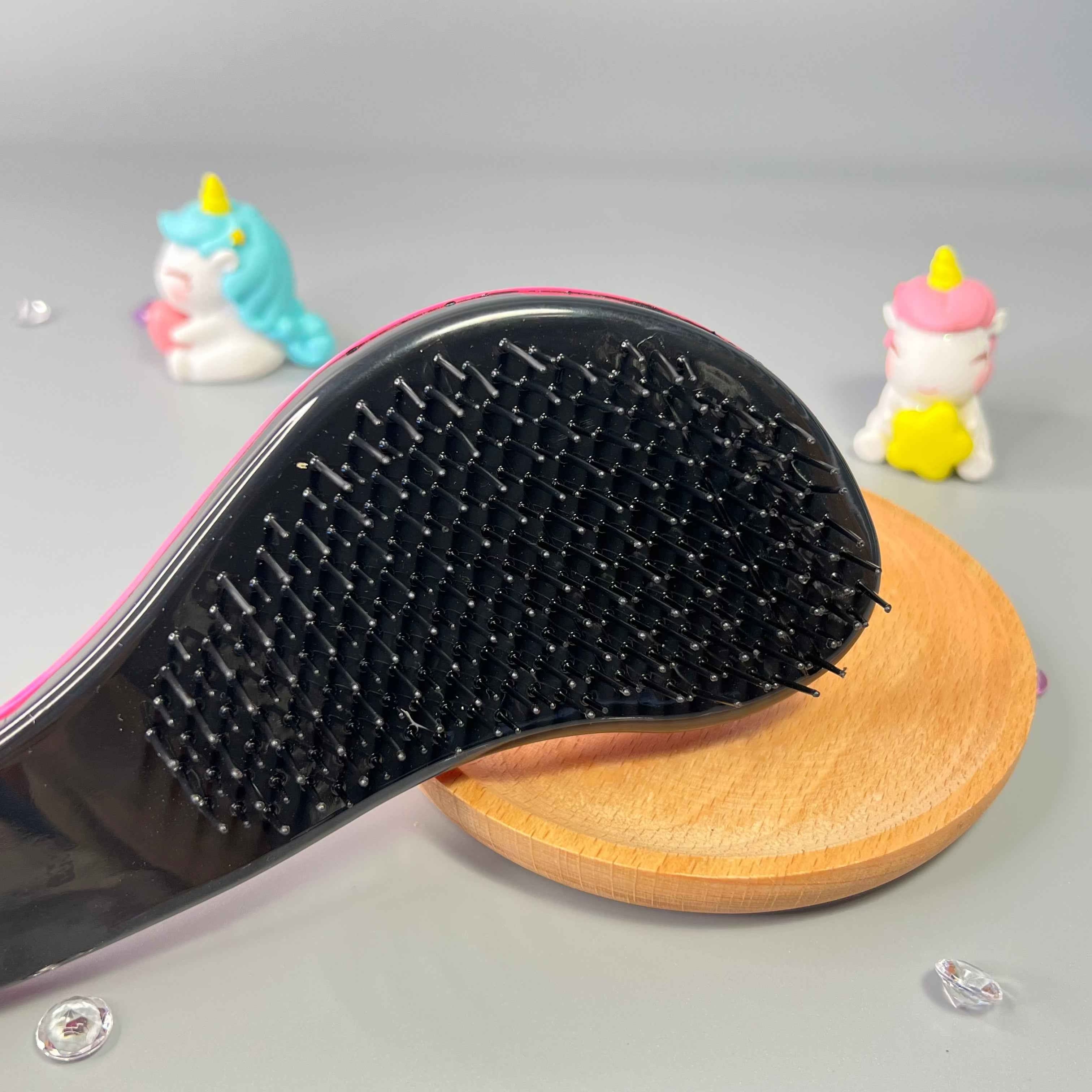 Brosse Bouclette pour démêler les cheveux bouclés d’un enfant