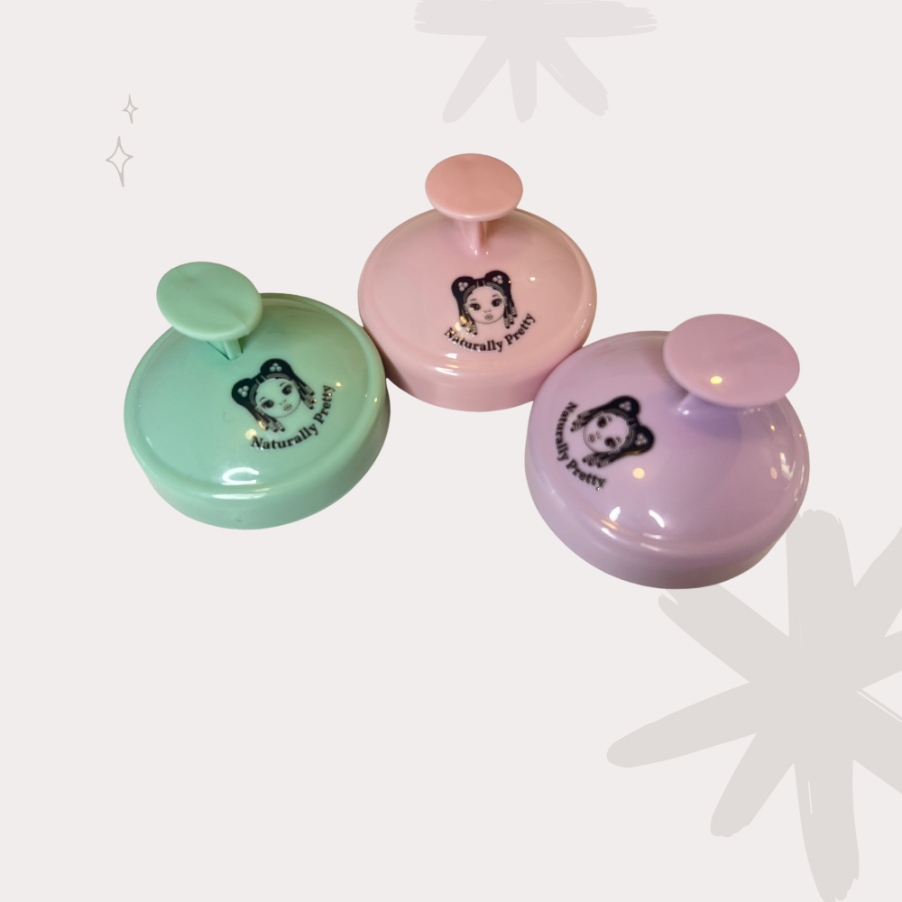 Lot de trois brosses massantes pastel Naturally Pretty, accessoires essentiels pour activer la pousse des cheveux texturés.