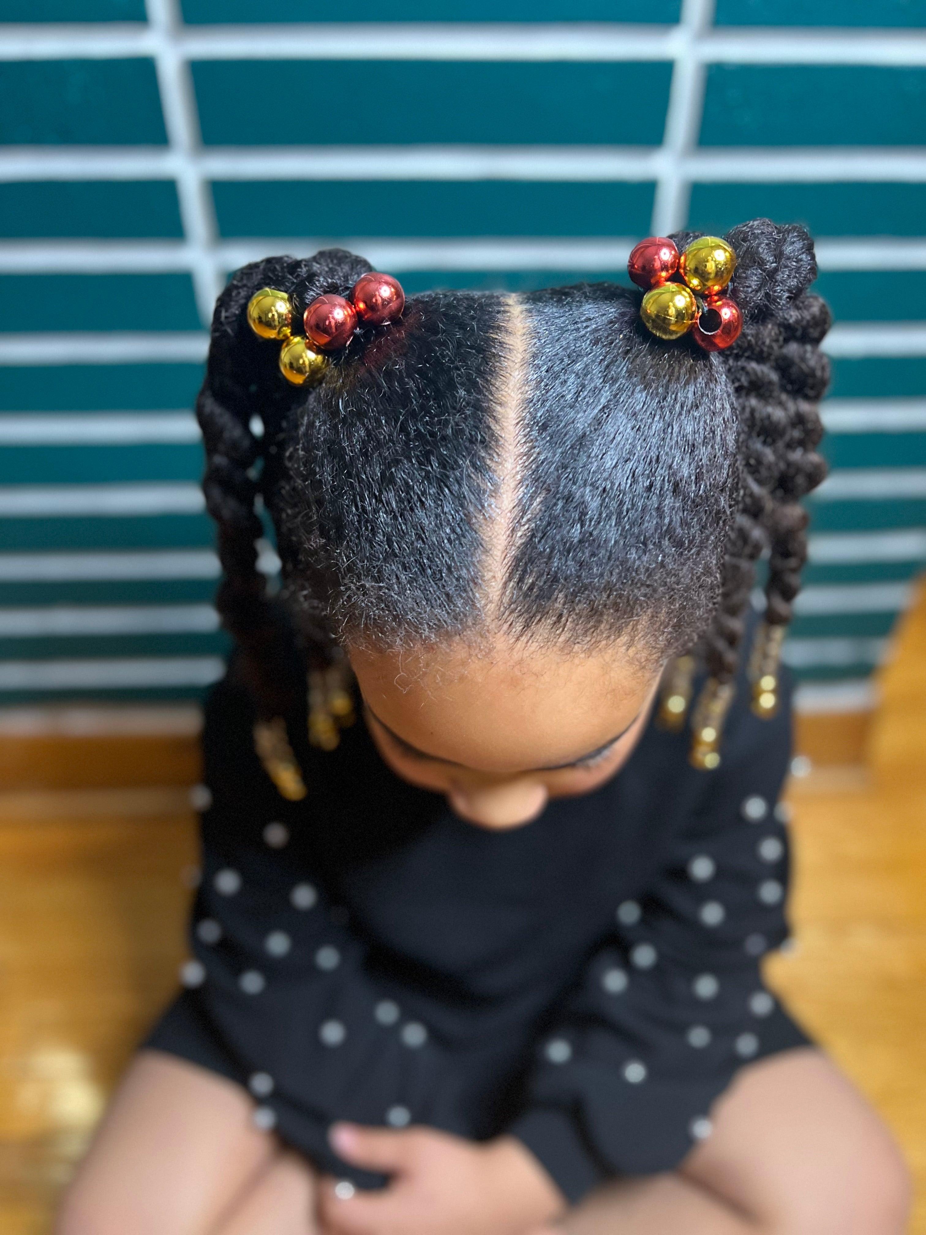 petite fille metis avec coiffure protectrice