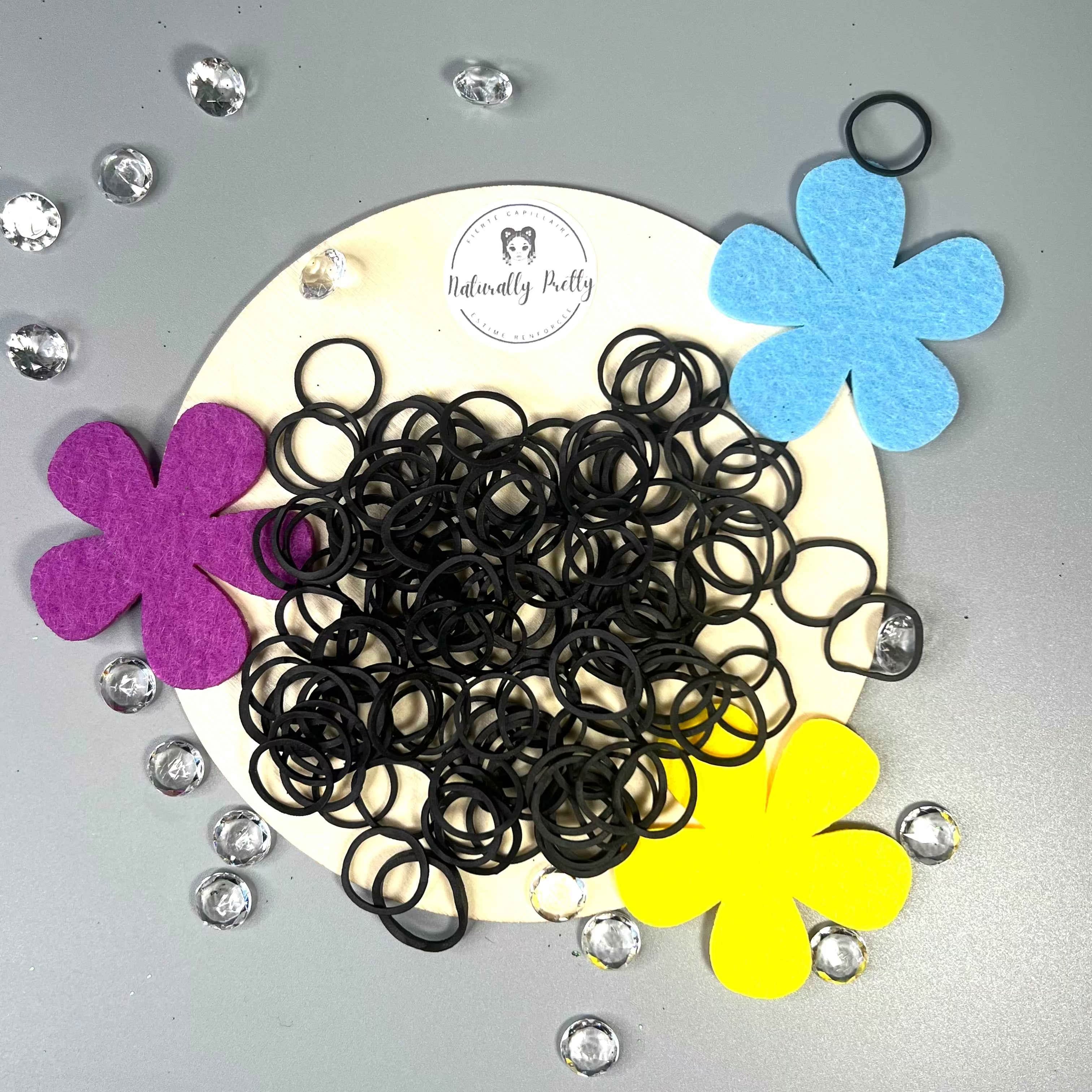 Petits élastiques noirs pour coiffure enfant