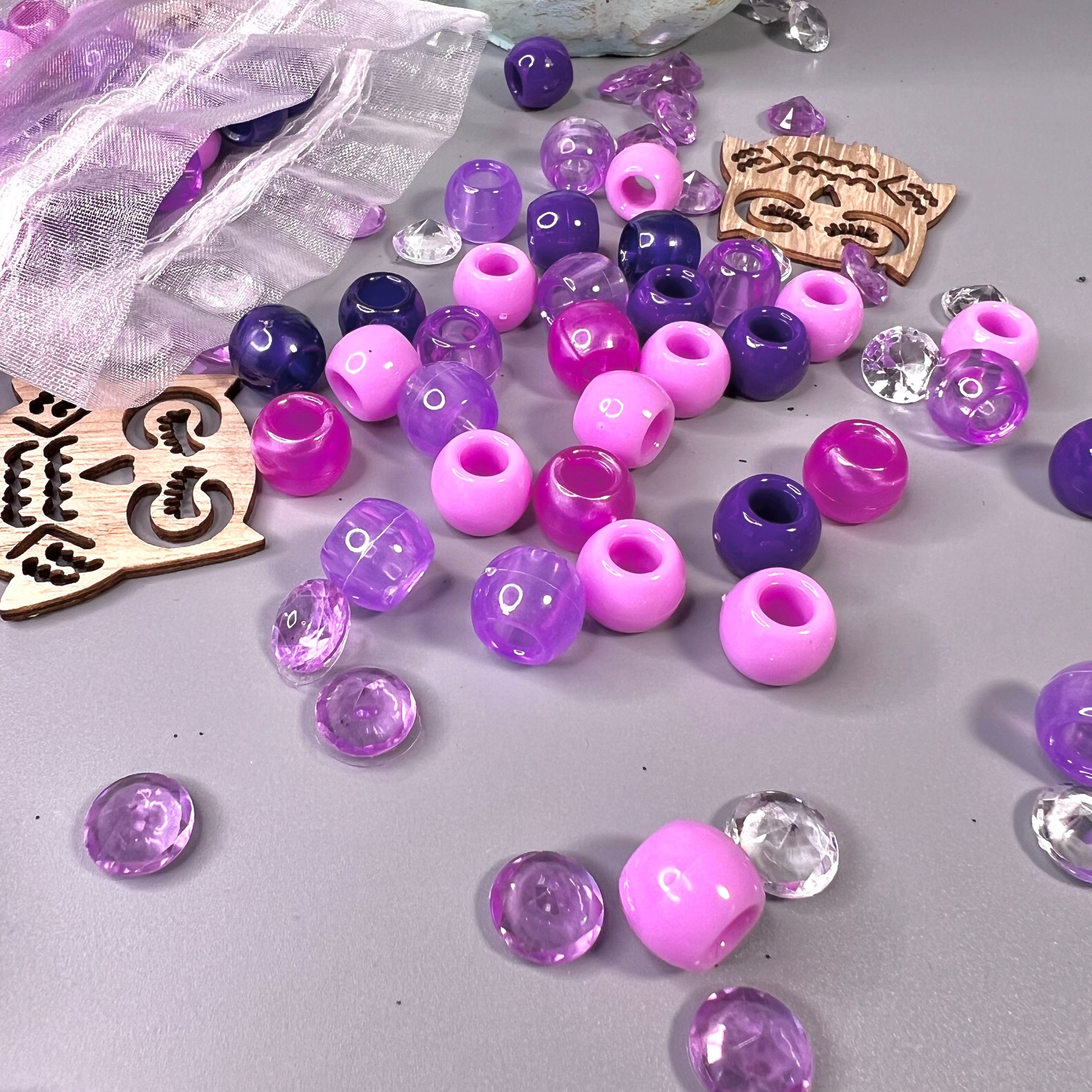 Grandes perles violettes pour coiffure d’enfant