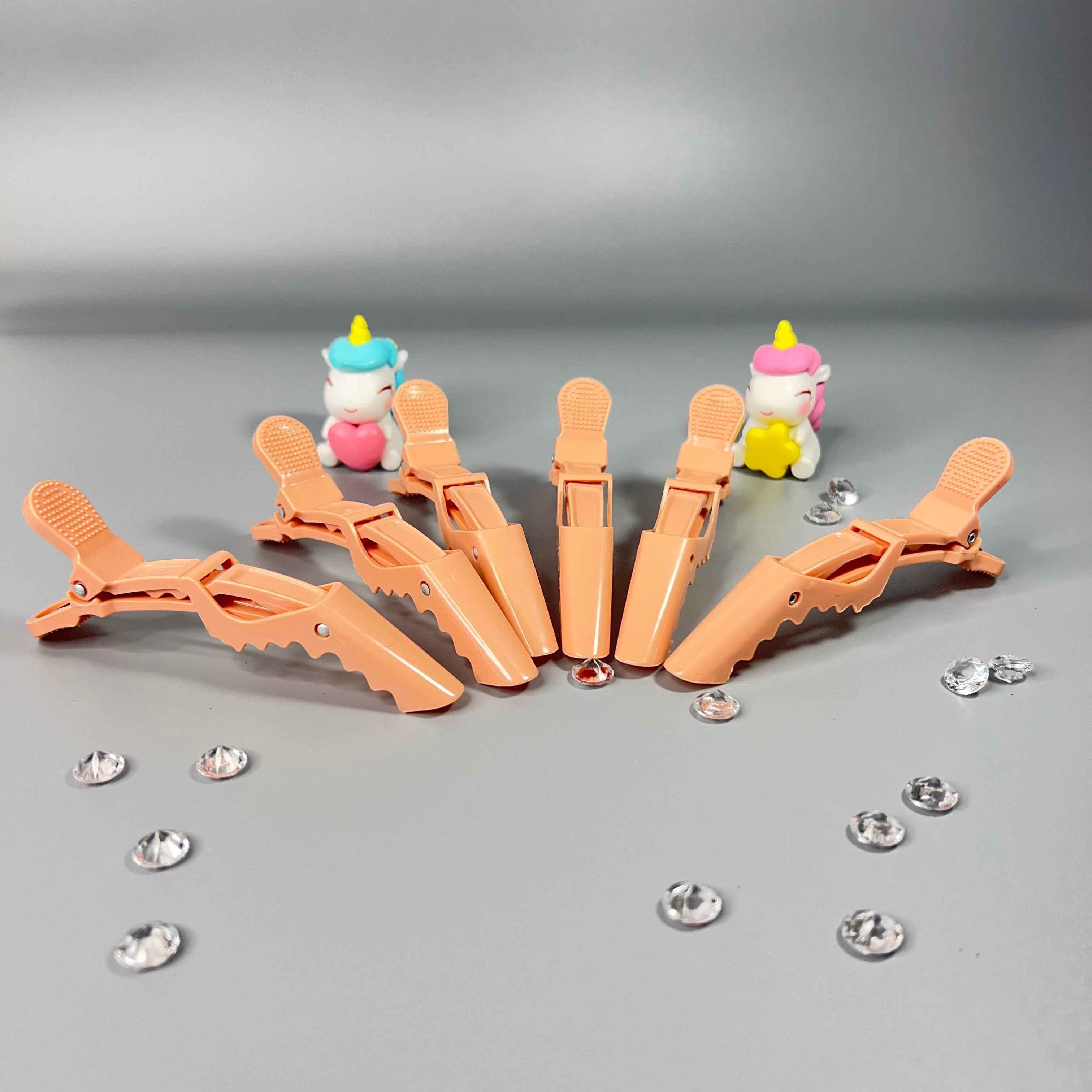 Pinces de sectionnement pour coiffure enfant